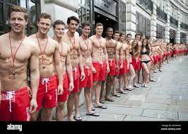Models Dressed As Lifeguards Pictured As They Open The New Gilly Hicks And  Hollister Flagship Stores On Regent Street, London Stock Photo - Alamy