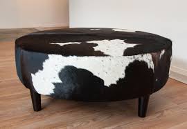 A Fantastic Chocolate Brown And White Round Cowhide Ottoman By Gorgeous Creatures Who Are A Cowhide Cowhide Ottoman Round Ottoman Leather Ottoman Coffee Table