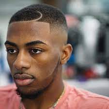 This retro haircut for black men has a top fade, and takes you back to the world of rock and roll. Pin On Black Men Hairstyles