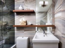 This is a small bathroom with a bathtub that suits any urban apartment where space is a constriction. Small Bathroom Designs Truly Tile Riffic