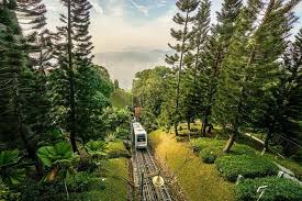 The connecting ridge at the top is known as strawberry hill, although the planned strawberry fields never eventuated because the thick vegetation proved to hard to tame. Dinner At Penang Hill 2021