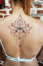 17 Pretty Lotus Flower Tattoo Ideas Tattoos For Women Flowers Spine Tattoos For Women Flower Tattoo Shoulder