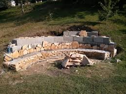 How to build a firepit with castlewall block / salty tales: Man Builds Amazing Fire Pit In Back Yard Where A Big Dirt Mound Used To Be Buzznick