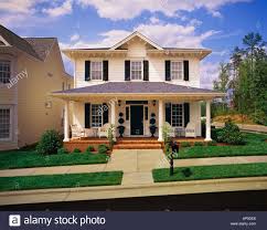 Except, a computer game instead of liquid. Small Two Story Yellow House Stock Photos Amp Small Two Story Yellow Yellow House Exterior House Shutters Outside House Colors