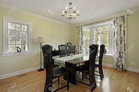 If you are fond of lively interiors and light environments, lime green dining chairs will serve perfect! Dining Room In Suburban Home With Light Green Walls Stock Photo Picture And Royalty Free Image Image 10292885