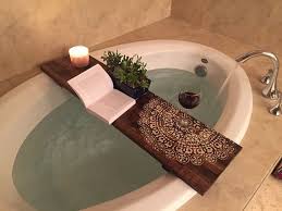 Perfect expandable bathtub caddy with reading rack or tablet holder, this premium bath tray includes a wine glass holder. This Beautiful Mandala Caddy Is Handmade With Cedar Wood And Painted With A Beautiful Mandala Tattoo The Mandala Repres Bathtub Caddy Rustic Bathtubs Tub Tray