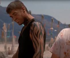 The butterfly tattoo on mr. 20 Fang Tastic Facts About From Dusk Till Dawn Eighties Kids