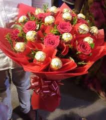 Check out our candy flower bouquet selection for the very best in unique or custom, handmade pieces from our bouquets shops. Red Roses And Chocolate Bouquet