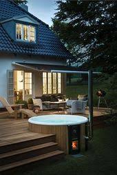 Eine Einzigartige Gartengestaltung Dekorieren Sie Ihre Terrasse Mit Einem Holzofen Gartengestaltung Gartendesign Ideen Garten Terrasse