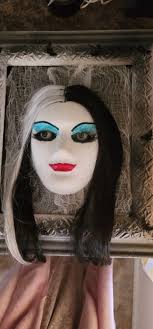 Yvonne De Carlo doing some Pumpkin sitting for Halloween!