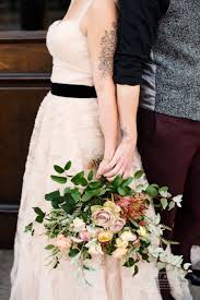 Wedding bouquet from white and red roses on white to snow. Pale Yellow Dusty Pinks And Tiny Red Berries Add So Much Texture And Life To This Milwaukee Bride S Wedding Bo Wedding Bouquets Bride Wedding Wedding Bouquets
