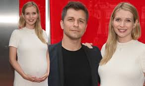 Would rather be talking cats/dogs/footy. Rachel Riley Showcases Baby Bump With Husband On Red Carpet At Singing In The Rain Psy Groups Online