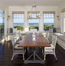 Hamptons styled bedside table with hanging pendant light in luxu. Beach House Decorating Ideas For 2020