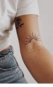 Sun And Rose Tattoo Inspiring Ladies Rising Sun Tattoos Sun Tattoos Body Art Tattoos