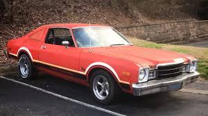 Image result for Spitfire Orange 1979 Colt