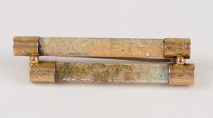 An antique Australian opal chip and yellow gold double bar brooch, housed  in a fitted and branded box SCOTT & WEHRLE Jewellers, Sydney , 19th  century, 5.2cm wide