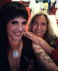 Who are the individuals in the photo with Sean from White Zombie?