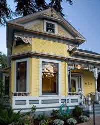 Again, i'd prefer a darker blue. 12 Charming Yellow Houses Town Country Living
