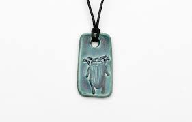 We did not find results for: Collectible Beetle Charm Necklace Teal Down East Shop