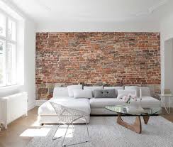 The decoration of the wall looks interesting with wallpaper under a brick, radically different in color from other surfaces in the interior. Close Up Image Of The Old Brick Wall Wallpaper Mural Living Room Brick Wall Interior Design 945x800 Wallpaper Teahub Io