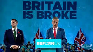 Nigel Farage blames half empty rally hall on 'staff incompetence', admitting it's been a 'difficult summer' for Reform
