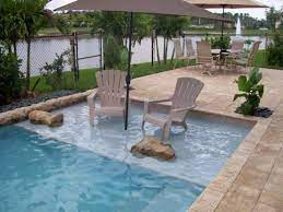 Little Seating Area In The Pool Small Backyard Pools Inground Pool Designs Small Inground Pool