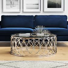 A simple round glass top resting lightly on sculpturally dynamic legs crafted in high polish stainless steel, the como embodies art and function. Nuevo Juliette Coffee Table Reviews Wayfair