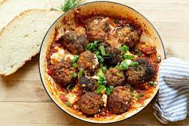 Keftedes Saganaki Greek Style Meatballs In A Tomato Feta Sauce Recipe Feta Greek Dishes Greek Cooking