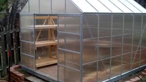 This simple indoor greenhouse is right for a small space, it's built of wood and there are some containers for growing. Collapsible Greenhouse Shelving Youtube