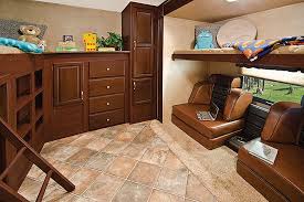 Bunkhouse rvs now come in all sorts of sizes, styles, and measurements, and come in all classes, whether motorhomes in class a, b, b+, or c, camping trailers, travel trailers (both lightweight and heavy), fifth wheels, and toy haulers—all varying in the comfort they can supply and the. Ultimate Family Bunkhouse Trailer Life Rv Interior Design Bunk House Rv Living