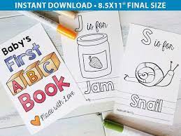 Allow guests to choose letters and draw pictures to go with it, writing the name of the object in the space at the bottom. Printable Abc Book Baby Shower Activity Alphabet Baby Book Etsy Baby Shower Book Baby Shower Activities Shower Activity