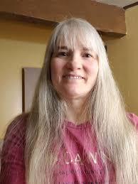 What is this 5' tall plant with small purple blooms?