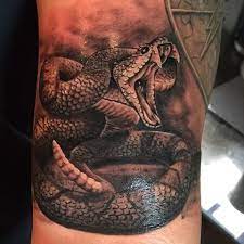 For some, the shedding of the skin can symbolize the moving on from an abusive relationship, troubled past, or serious addiction. 43 Rattle Snake Tattoos