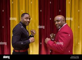 Sgt. Teddy Randolph Jr. (left) and his father retired Cpl. Teddy Randolph  Sr. pose for a photograph during an induction ceremony held aboard Marine  Corps Base Camp Lejeune, N.C., April 16, 2016.