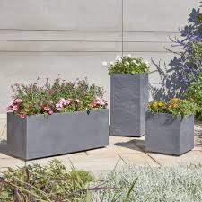 Outdoor round plastic pot, for plantation, size: B Q S Durdica Rectangular Trough S Filled With Bright Flowers Are A Stunning Way To Add Pops Of Colour To Your G Garden Troughs Plastic Plant Pots Gray Planter