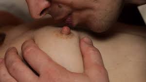 Erotic boob kiss
