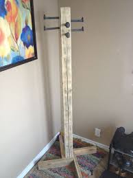 Easy Diy Coat Tree I Used Hooks Purchashed From The Hardware Store Instead Of Railroad Spikes Diy Coat Rack Diy Clothes Rack Diy Hat Rack