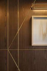 Wood Panels With Gold Finish Metal Lines Art Deco Inspired Wood Wall Design Contemporary Art Deco Art Deco Hotel