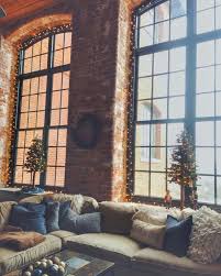 Cozy Loft Style Apartment Christmas Decor Exposed Brick Wall With Tall Ceilings And Stai Loft Style Apartments Loft Apartment Decorating Christmas Apartment