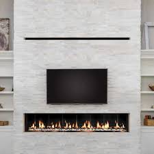 Wood is arranged in the bottom of a fireplace and ignited with a match or lighter. Slim Line Built In Archives Solas Contemporary Fireplaces