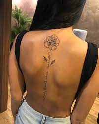 Whether you want a red, yellow, purple, white, pink or red rose on your shoulder, chest, forearm, wrist, or back, this gallery of pictures will spark your creativity. Rose Tattoo In 2021 Tattoos For Women Flowers Spine Tattoos For Women Girl Spine Tattoos