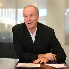 Real estate tycoon's trust sues his son — and he responds in kind