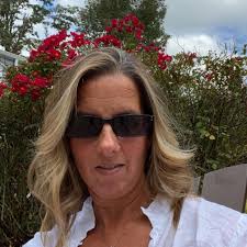 What charter boats in Naples can accommodate 50 people for a sunset cruise  in August?