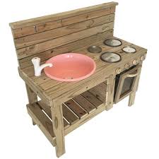 A mud kitchen for kids in its simplest form is an outdoor structure where kids can use sand, water and mud to try their hand in cooking. Mud Kitchen Diy Wooden Jungle Gyms The Pole Yard