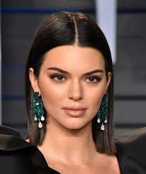 He used the @t3 micro singlepass flat iron to straighten her hair and used texture cream for a slicked back look. Image Result For Long Straight Hair Center Part Tucked Behind Ears Kendall Jenner Hair Long Bob Haircuts Kendall Jenner Haircut