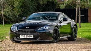 Image result for Storm Black 2013 Aston Martin