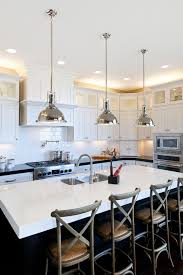 This rustic wooden kitchen is paired with a white vaulted ceiling that makes a perfect combination. Edison Light Bulb Dining Room Farmhouse With Painted Inset Cabinetry Wooden Benches