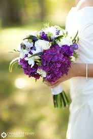 This time the ever popular hydrangea wedding bouquet. Purple Bridal Bouquet Purple Bridal Bouquet Purple Wedding Bouquets Hydrangea Bridal Bouquet