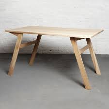 The table is crafted from wood and sculpted glass and is a little over five feet in length. Mk1 Transforming Mini Oak Duffy London Touch Of Modern