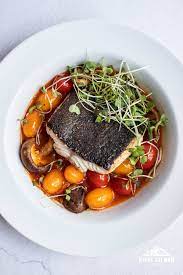 Seared Sablefish Black Cod In Tomato And Saffron Broth With Pan Soft Recipe Sitka Salmon Shares Recipe In 2021 Sablefish Recipes Stuffed Peppers